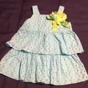 Girls sky blue dress with flower embellishment